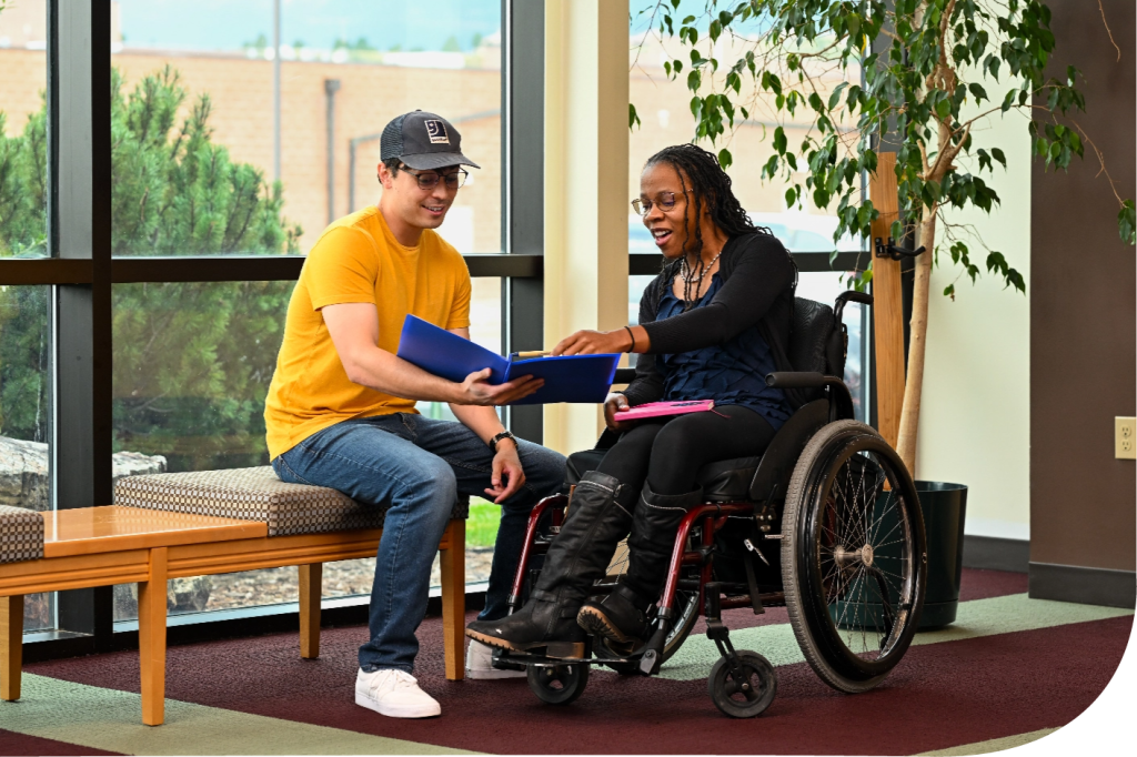 Welcome invitation given by men to women sit on wheelchair